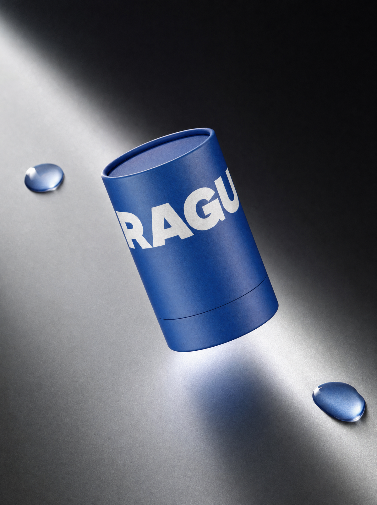 The Frague tube on a grey ground, lit by a hard beam of light